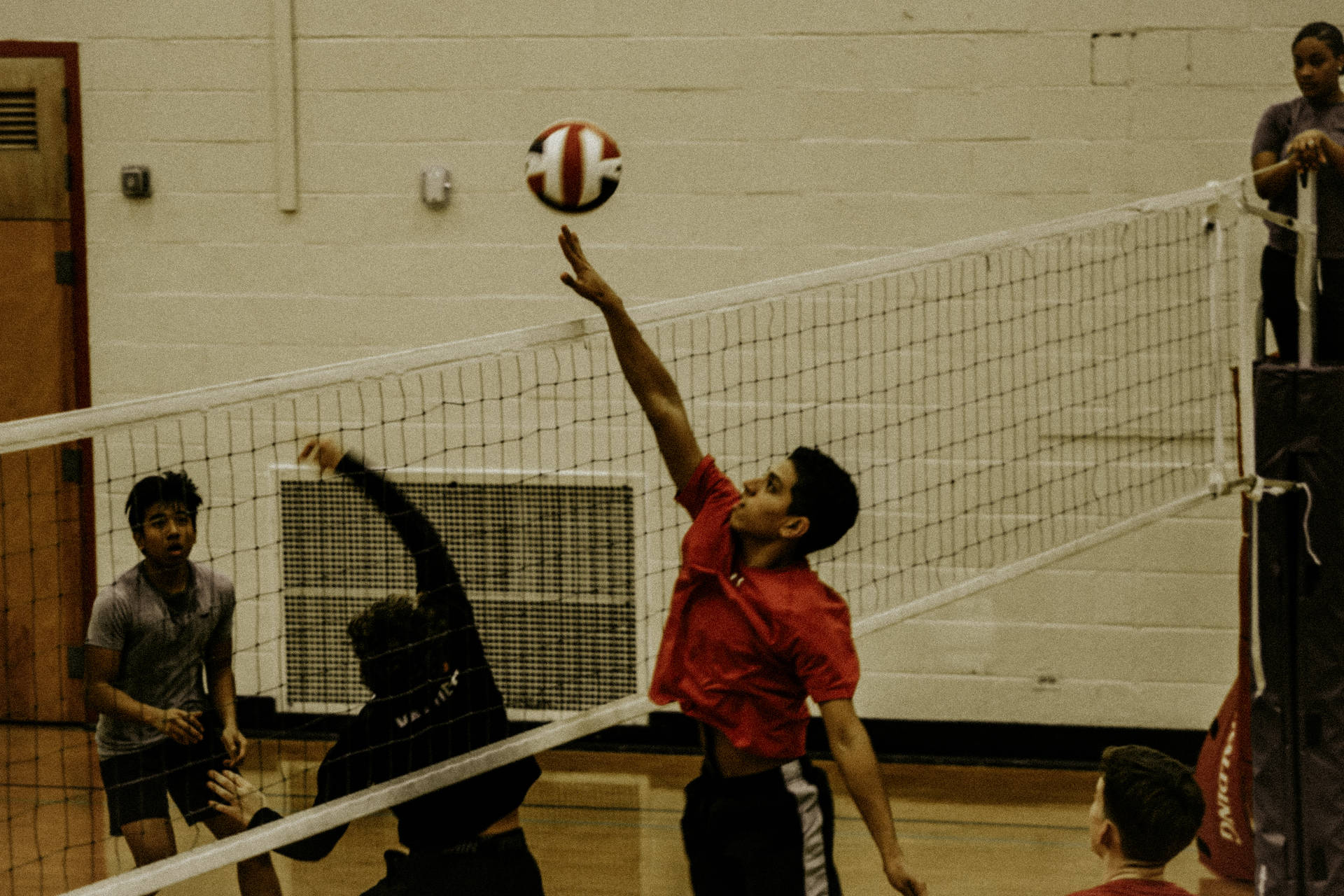 Volleyball Player In Red Jersey Background