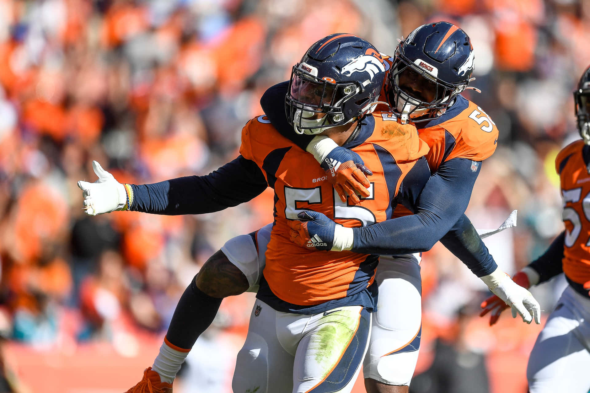 Von Miller Piggy Back Bradley Chubb Background