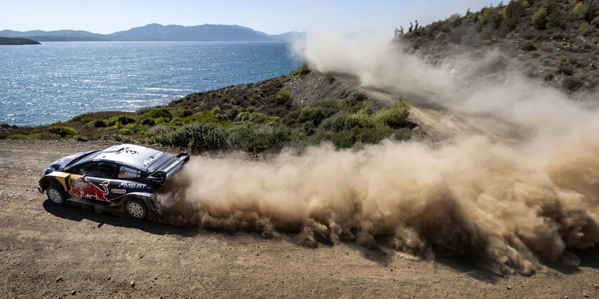 W R C Rally Car Dust Trail Seaside Track.jpg Background