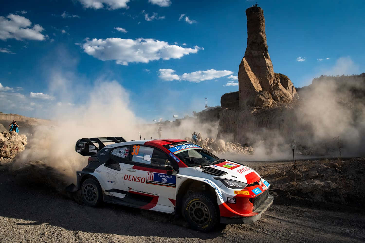W R C Rally Car Dusty Trail Speed Background