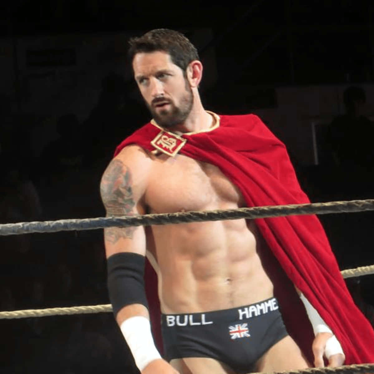 Wade Barrett Wearing A Cape Background