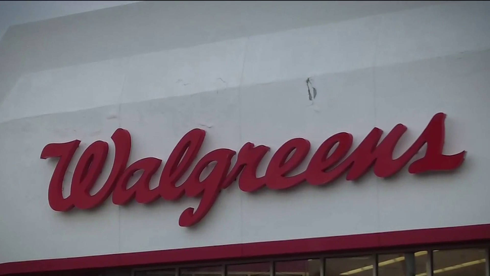 Walgreens Logo On White Concrete Wall