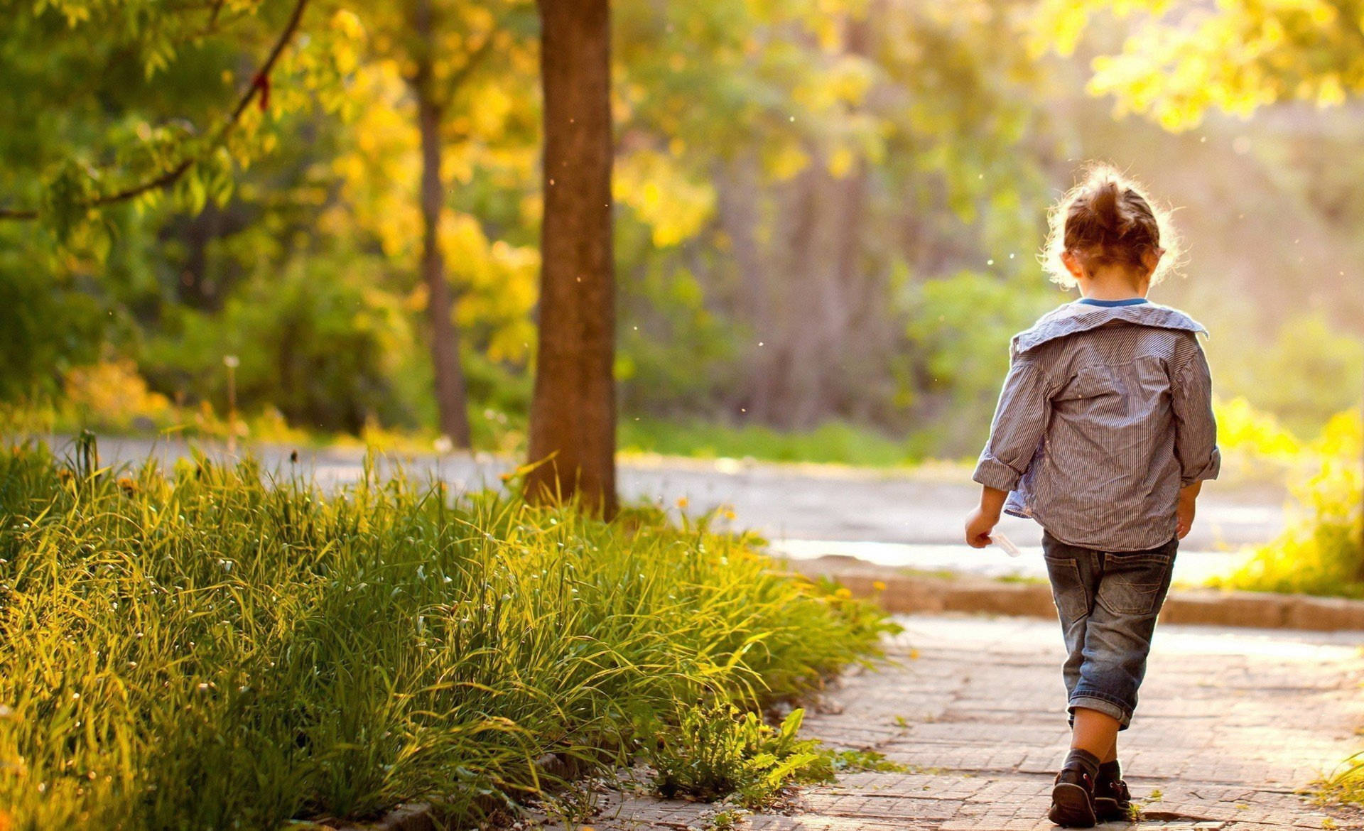 Walking Child On A Sunny Day