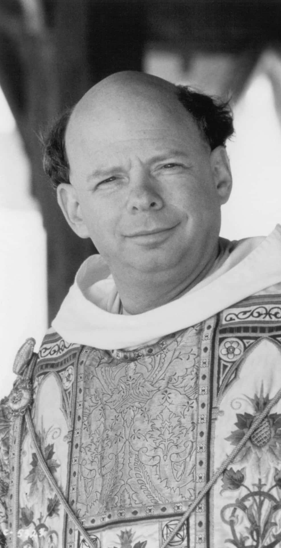 Wallace Shawn Posing During A Photoshoot Background