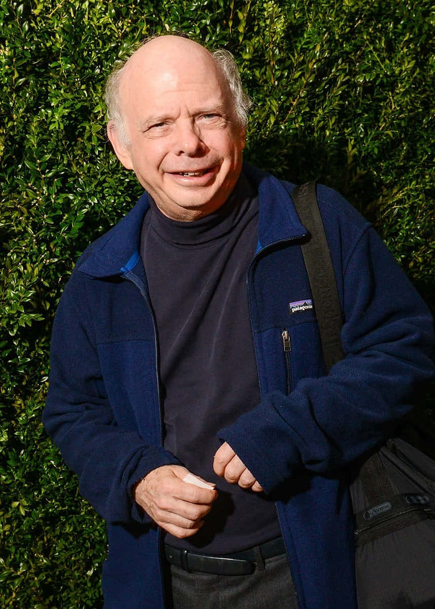 Wallace Shawn Posing During An Event Background