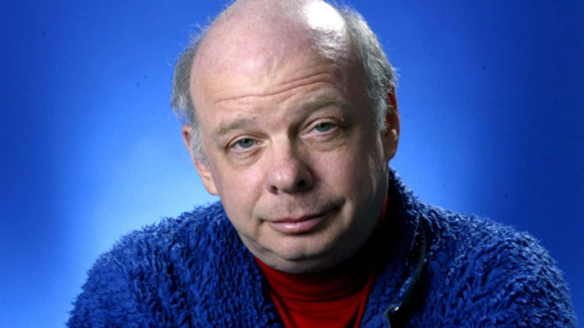 Wallace Shawn Posing For A Portrait Background