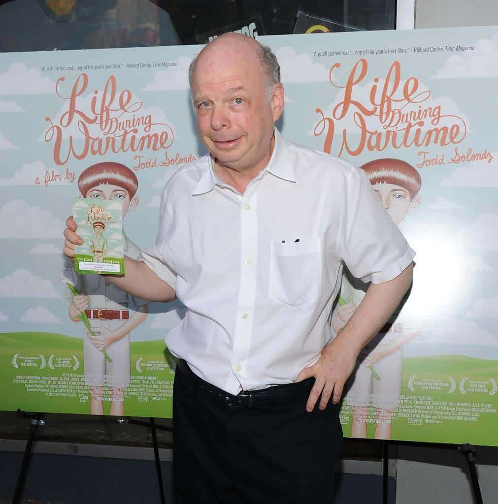 Wallace Shawn Standing In A Pose Background