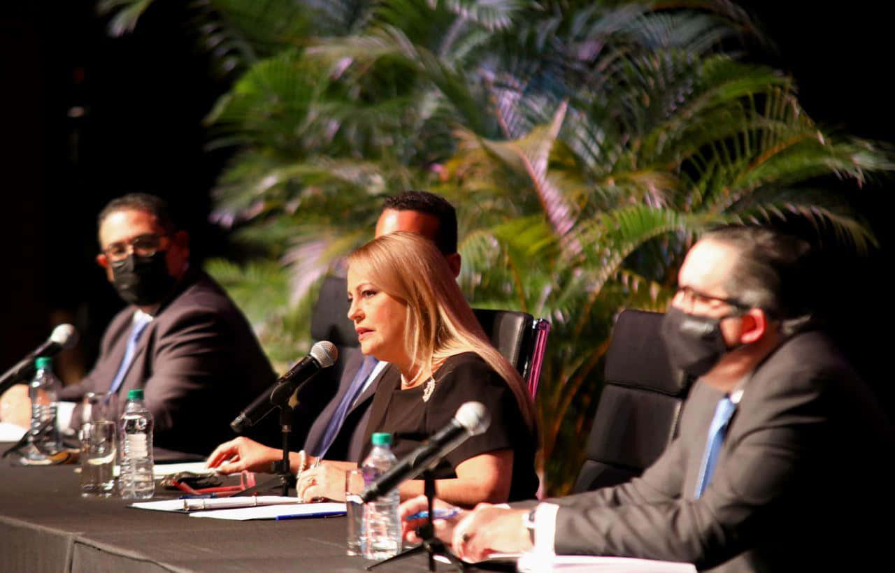 Wanda Vázquez Garced In A Conference Background
