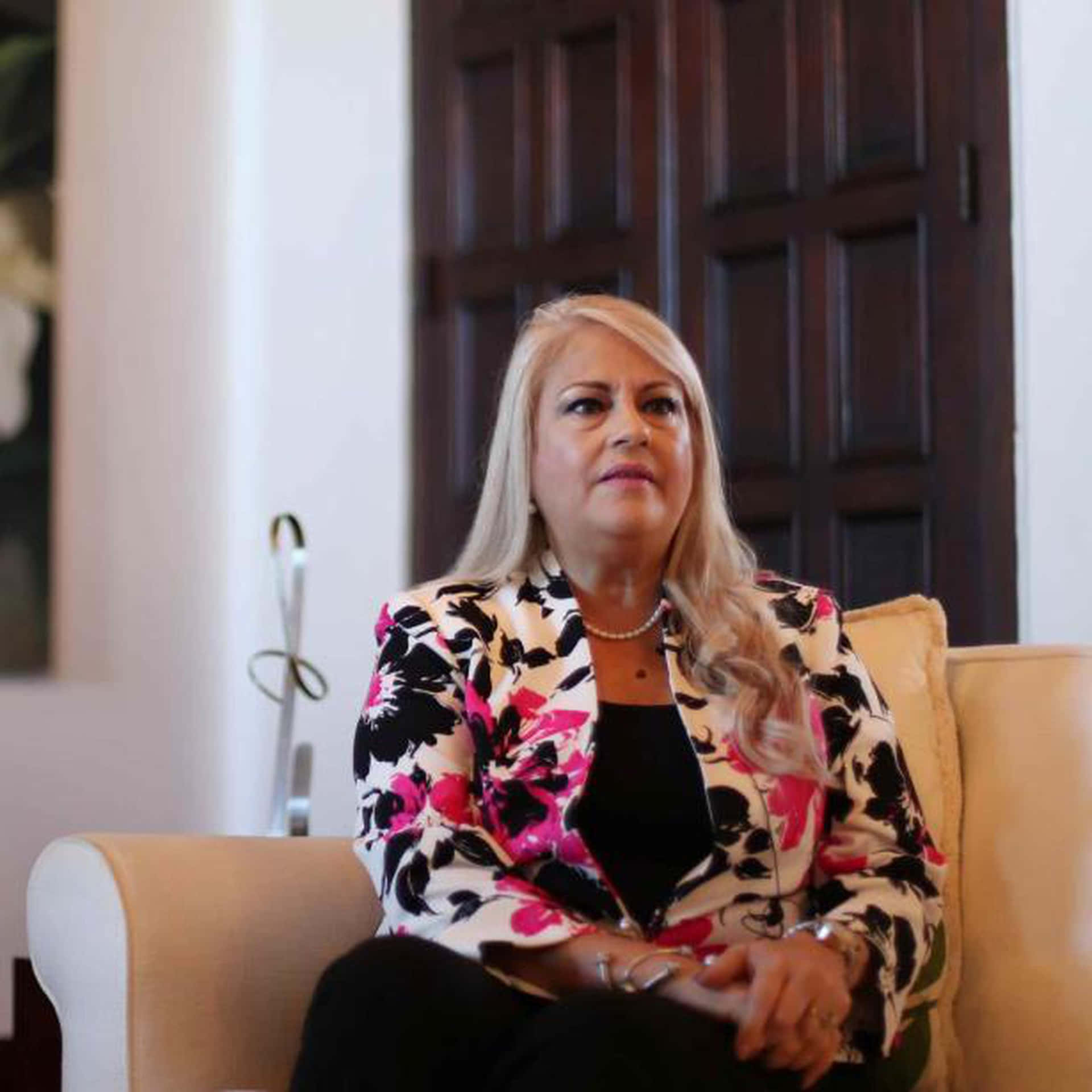 Wanda Vázquez Garced In Multicolored Blazer Background