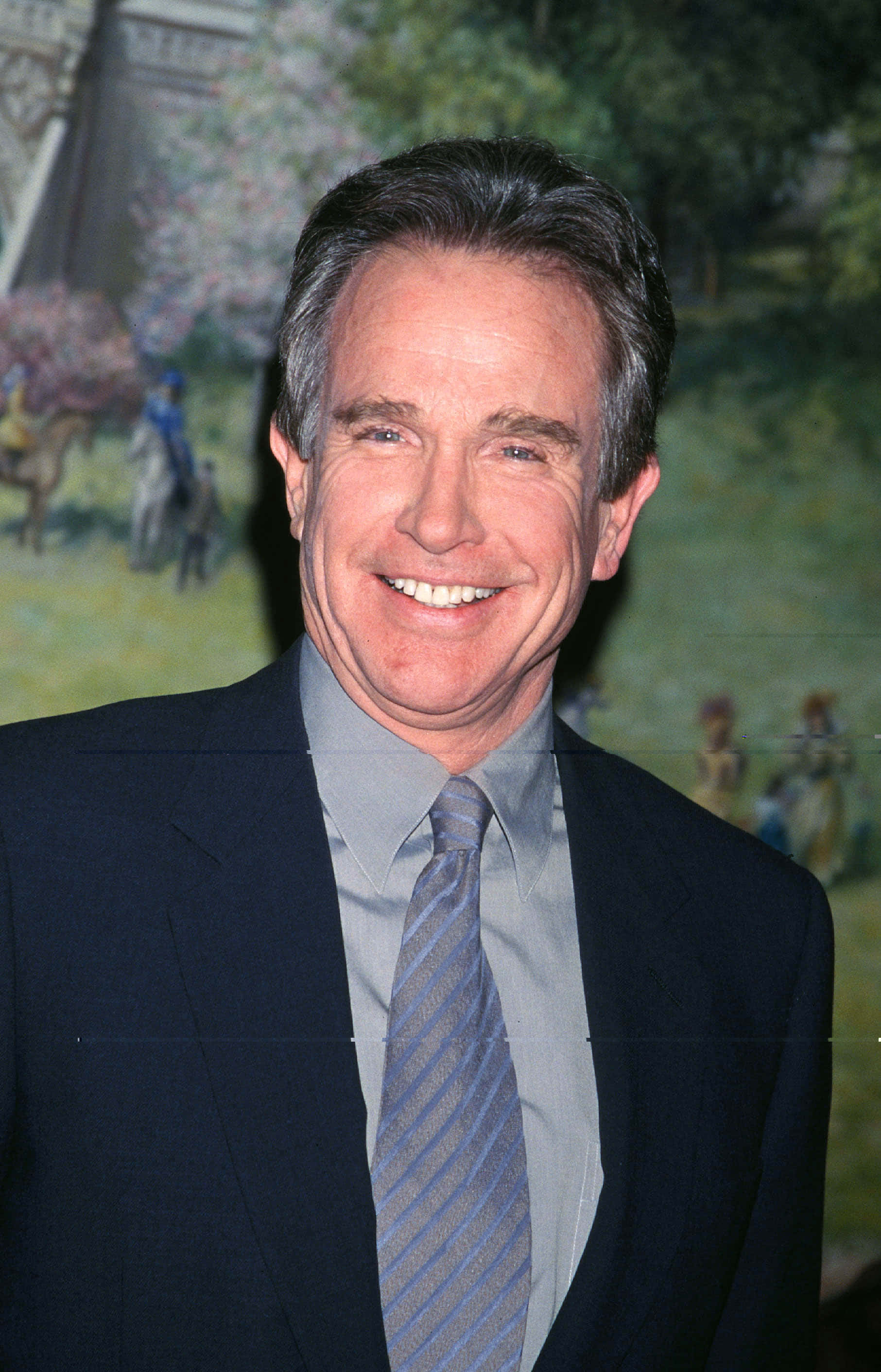 Warren Beatty In A Classic Black Suit Background