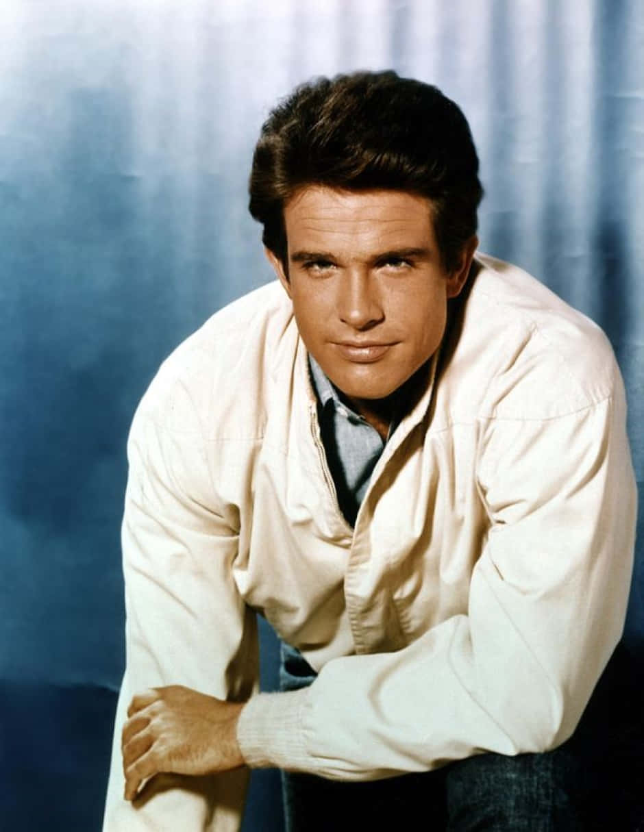 Warren Beatty Smiling In Classic Black Suit Background