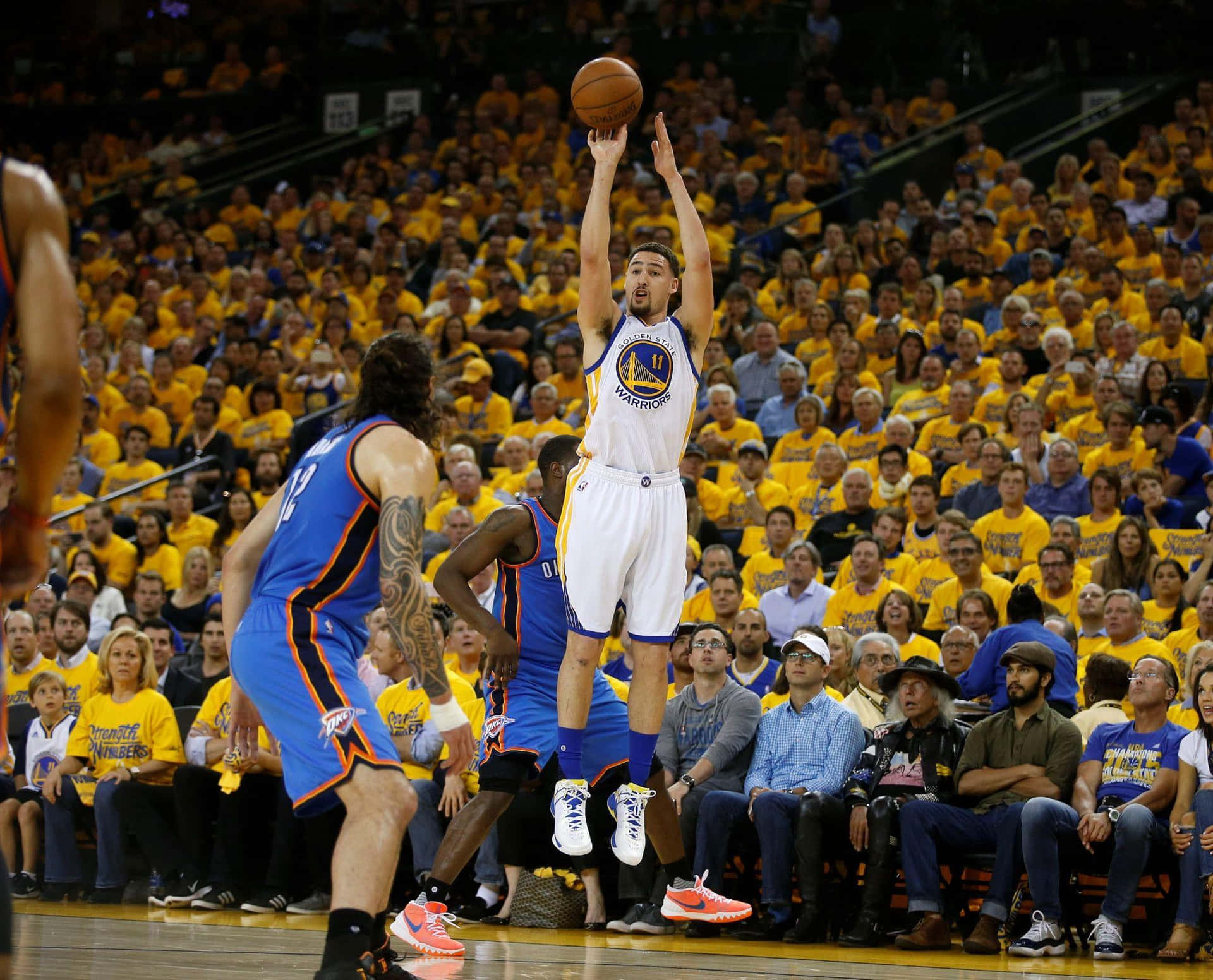 Warriors Basketball Player Jump Shot Background