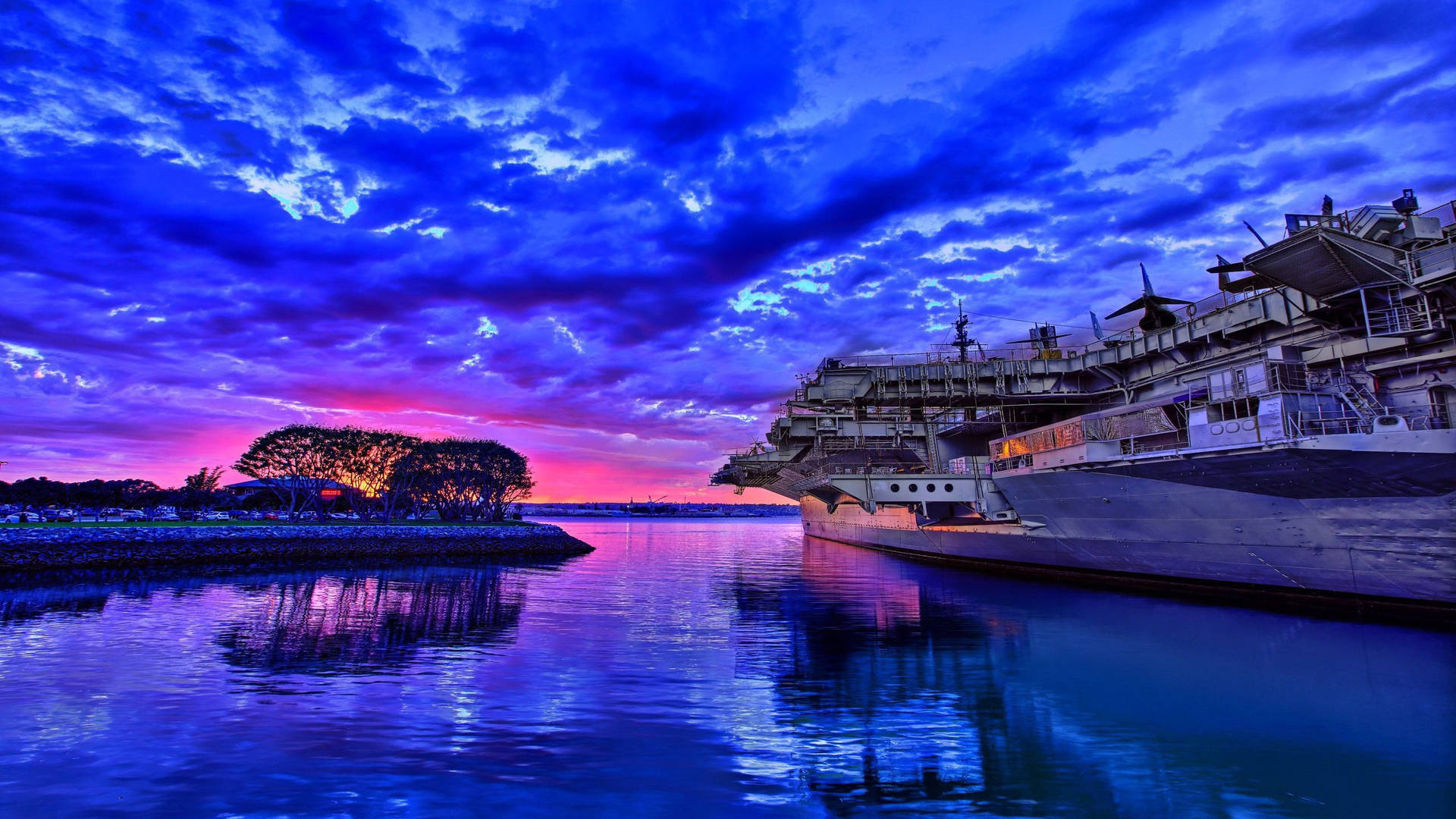 Warship And Blue Clouds Background