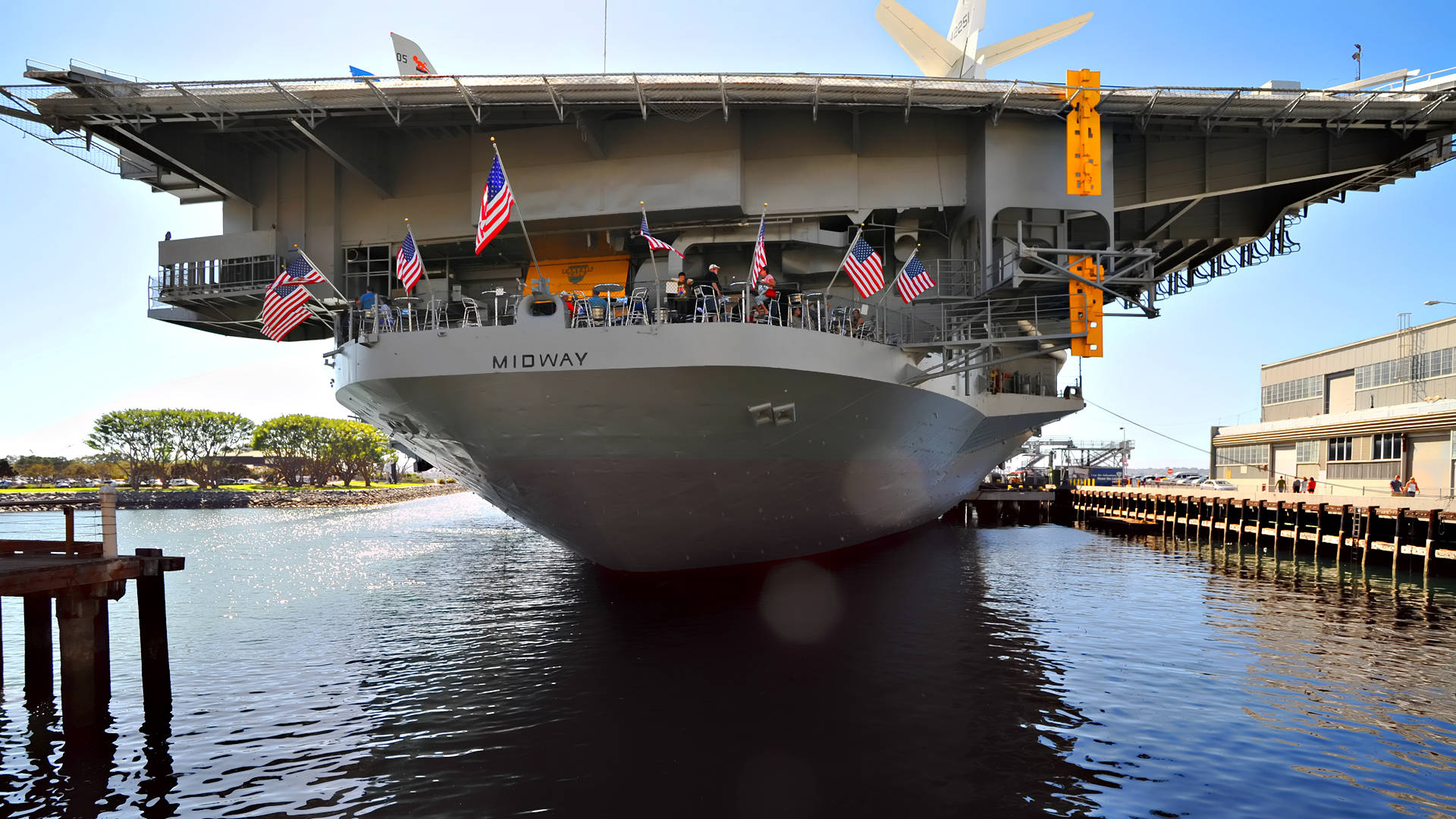 Warship With Flags Background