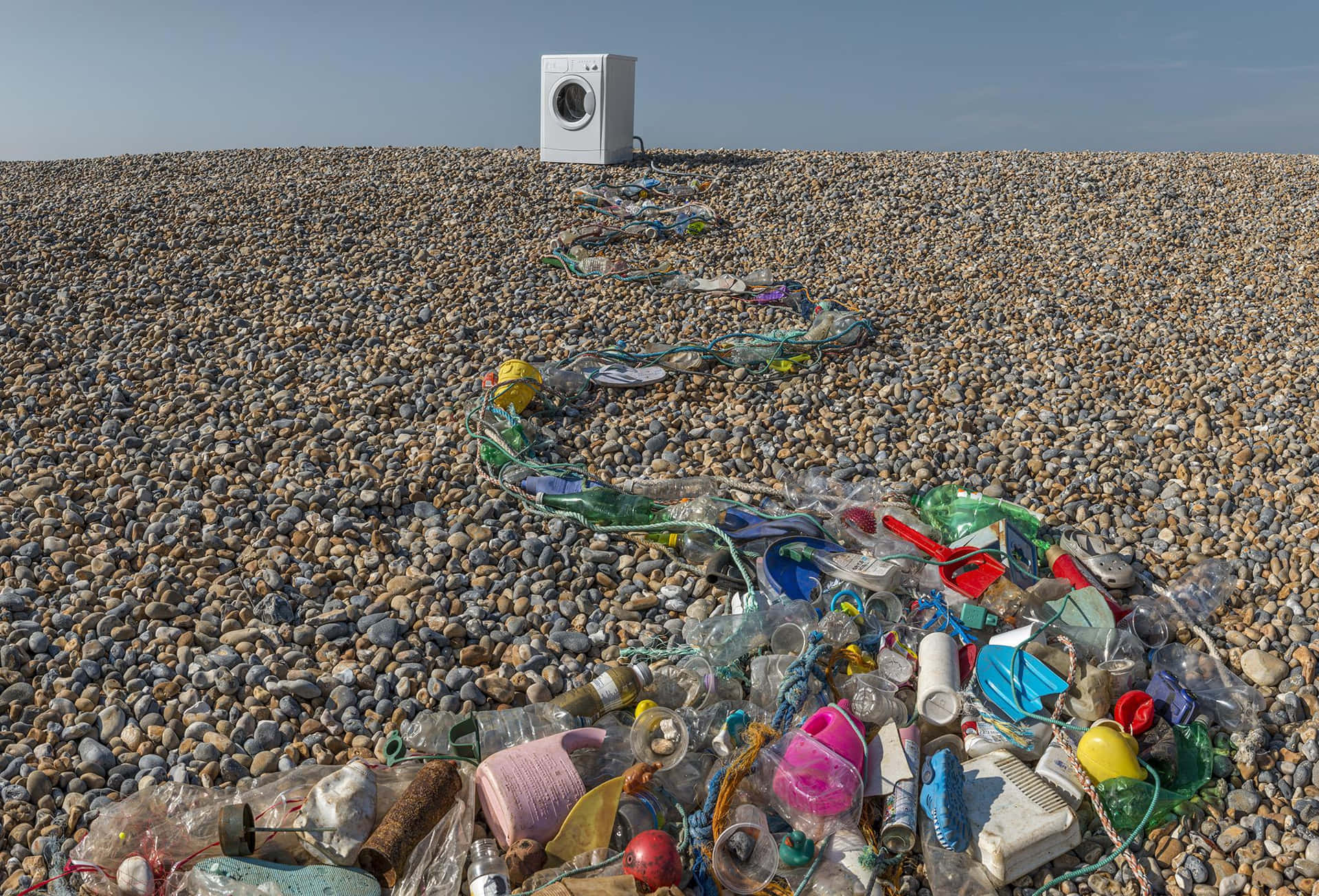 Washing Machine Amongst Beach Litter Background