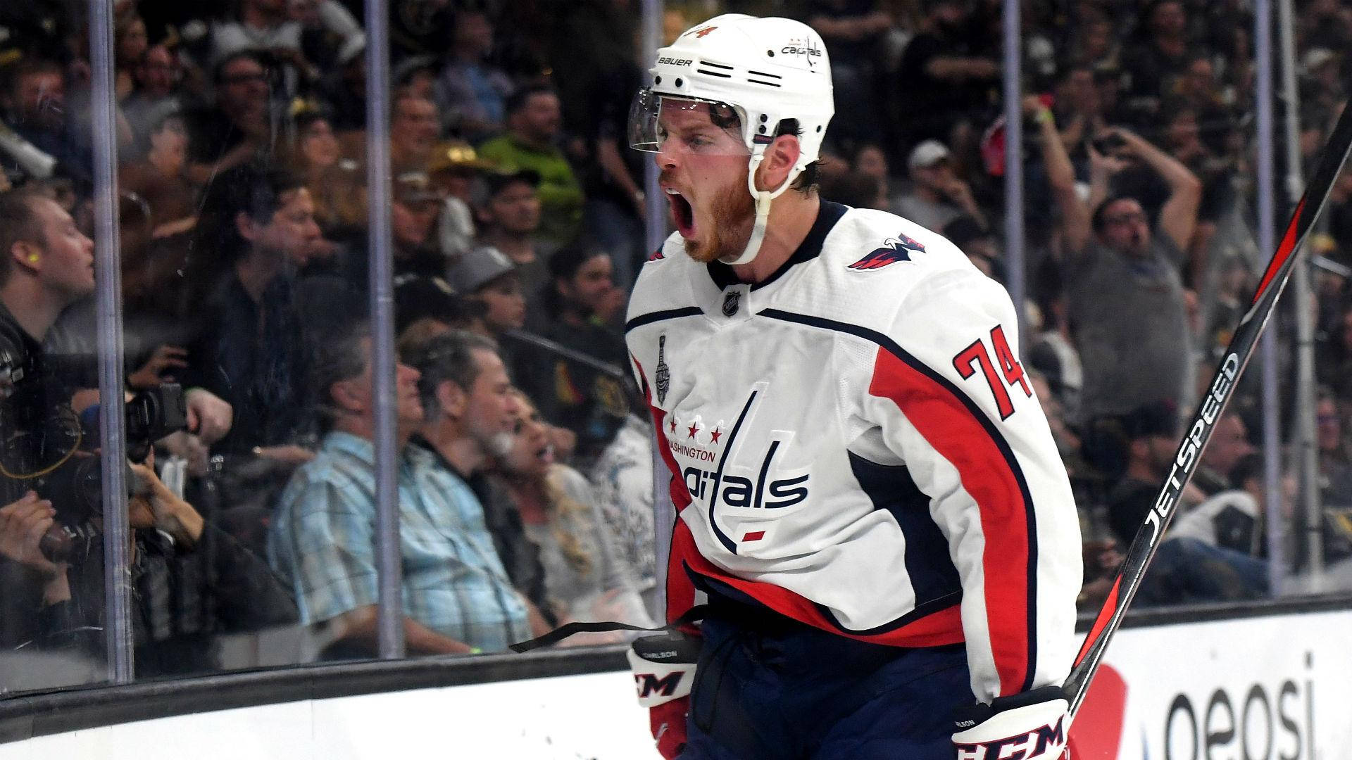 Washington Capitals' Defenseman, John Carlson, In Action. Background