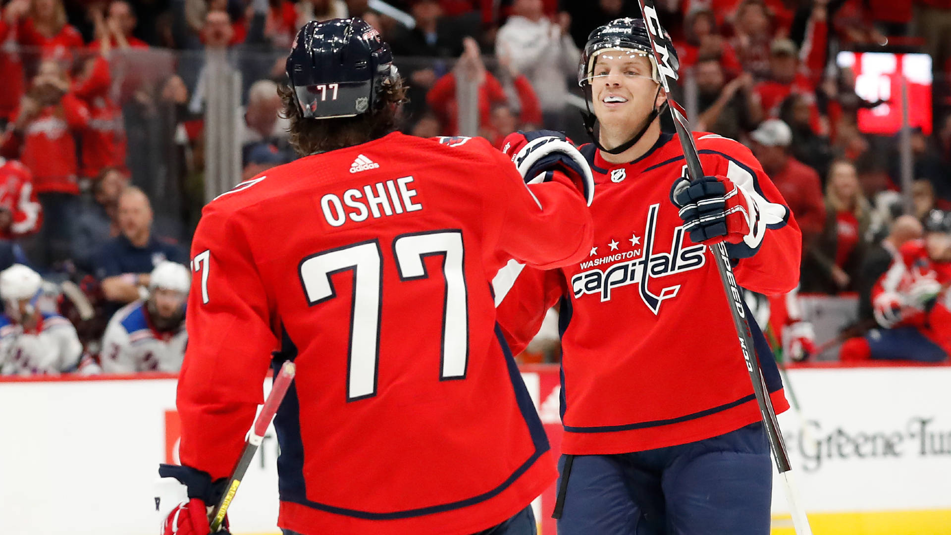 Washington Capitals John Carlson Fist Bump With Oshie Background