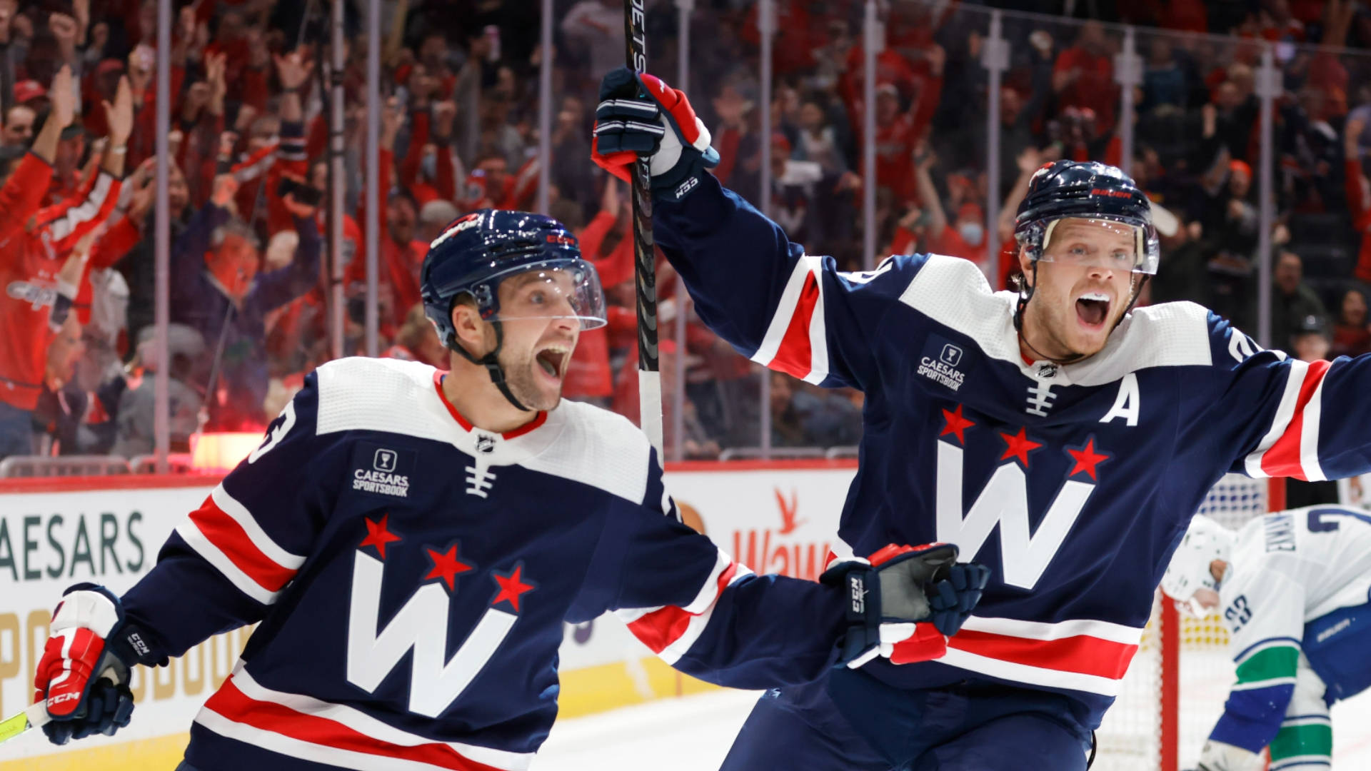 Washington Capitals John Carlson Victory Over Vancouver Canucks Background