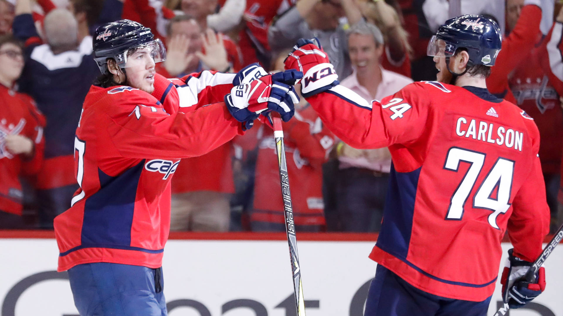 Washington Capitals John Carlson With Oshie On Field Background