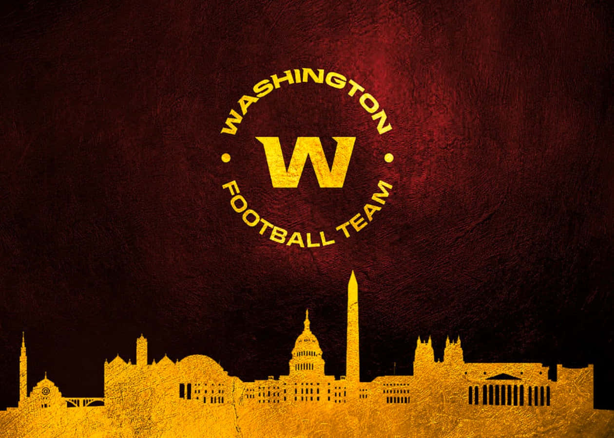 Washington Football Team In Action On A Vibrant Stadium Field Background
