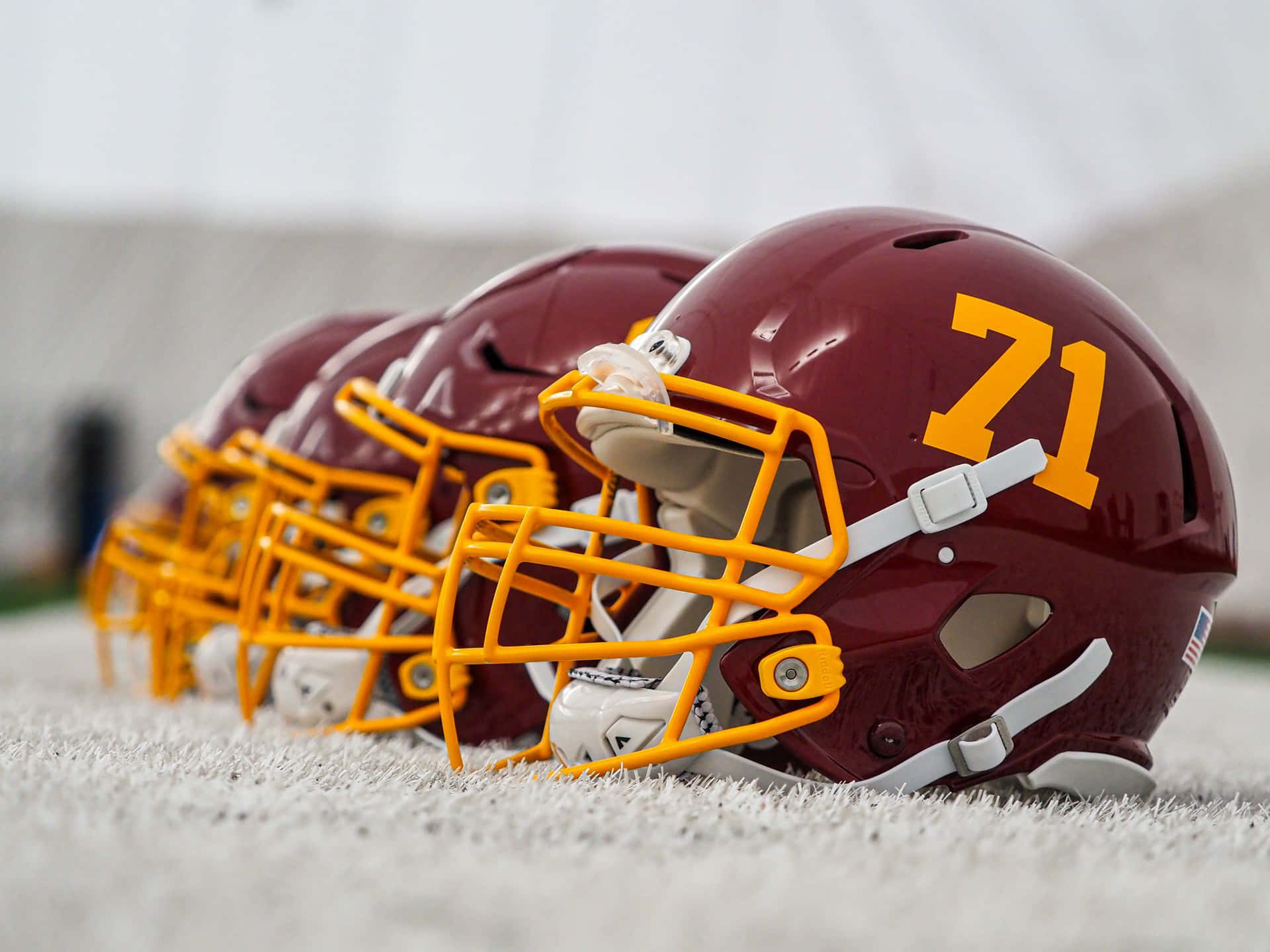 Washington Football Team In Action On The Field Background