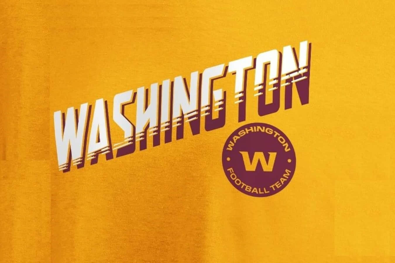 Washington Football Team In Action On The Field Background
