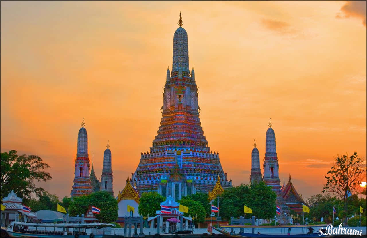 Wat Arun Against An Orange Sky
