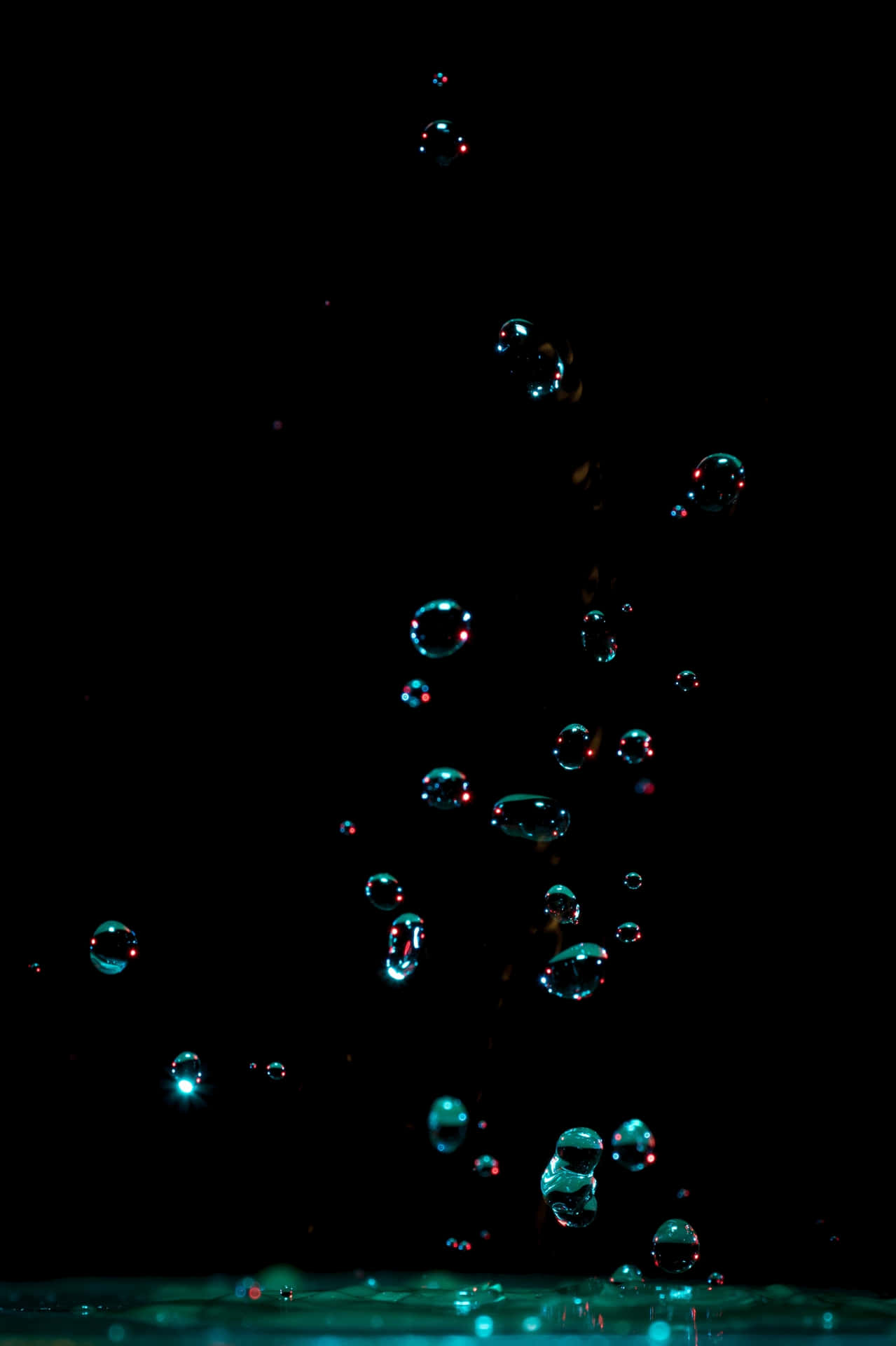 Water Bubbles Floating In The Water Background