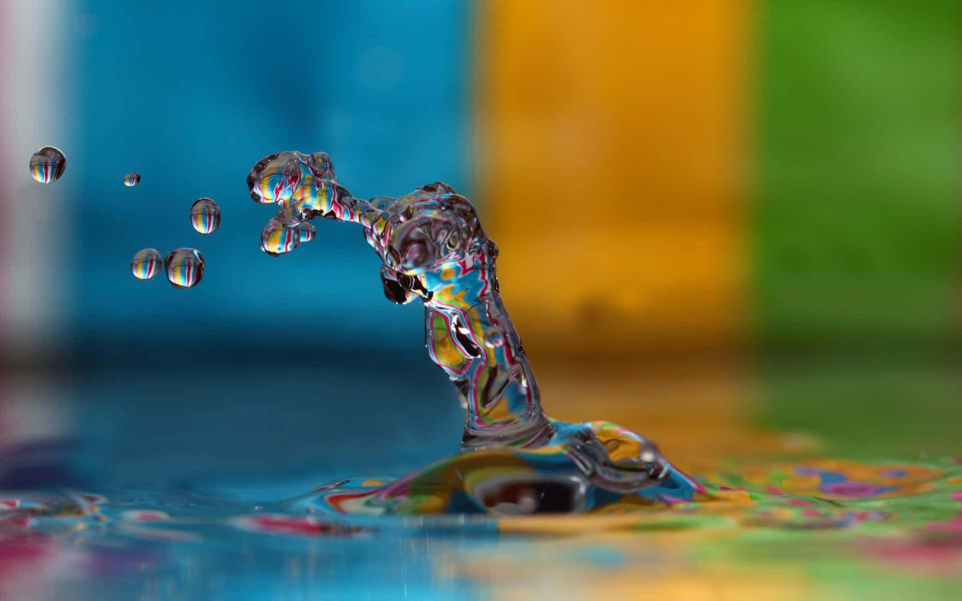 Water Drop On Colorful Background Background