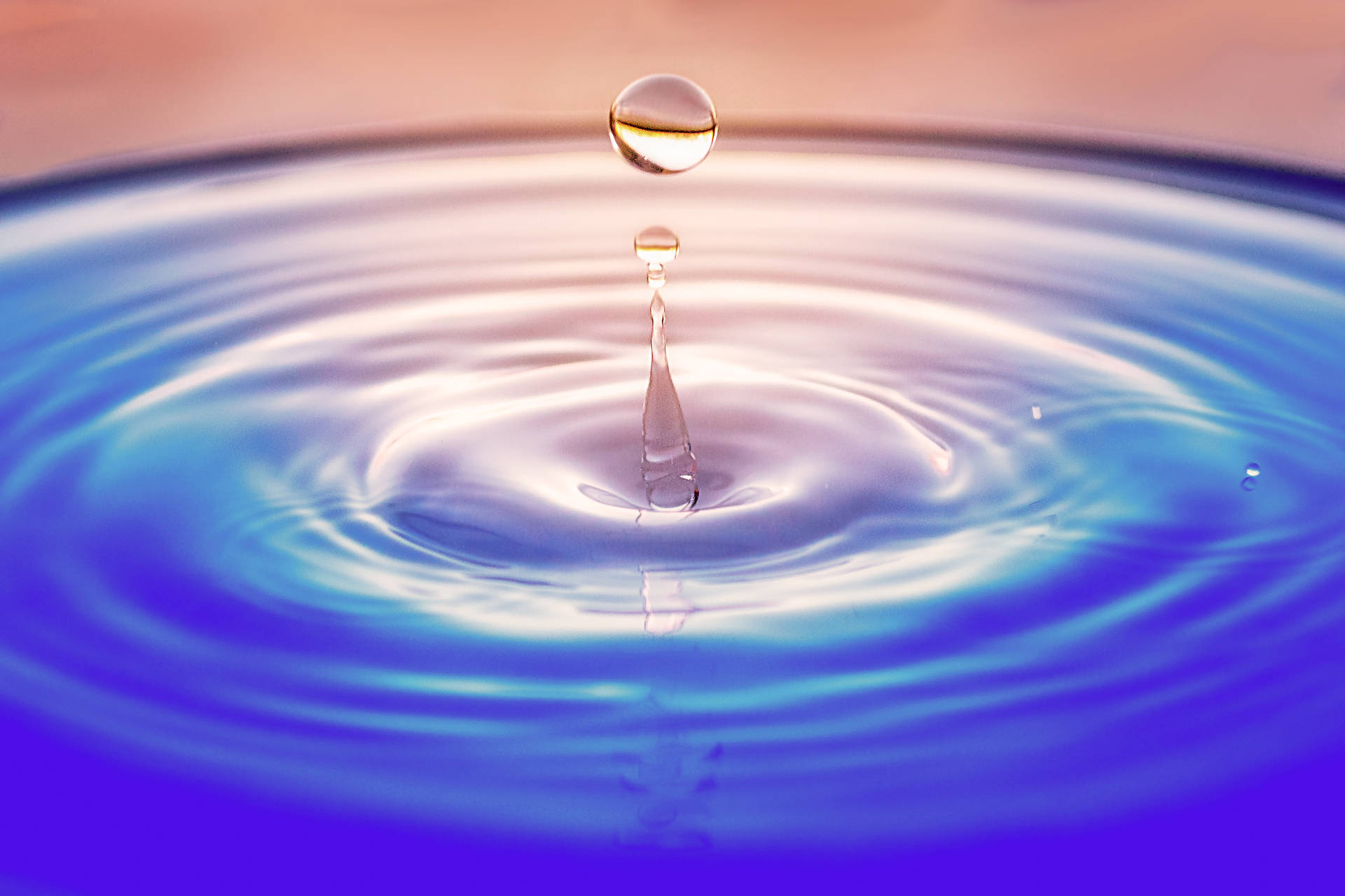 Water Droplet And Ripple Background