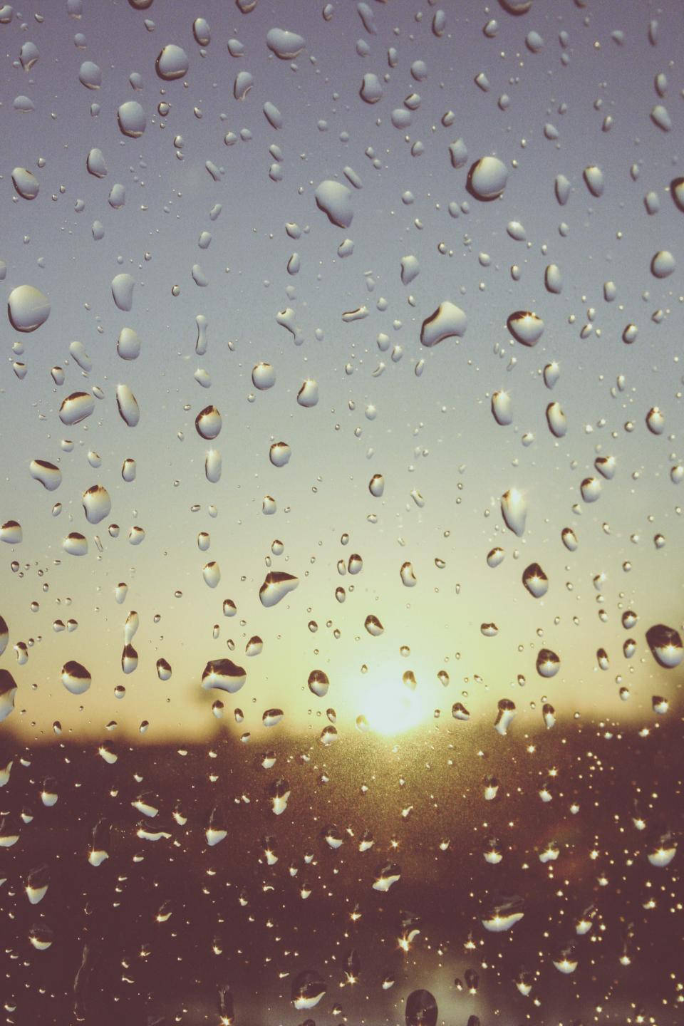 Water Droplets And Sunset Background