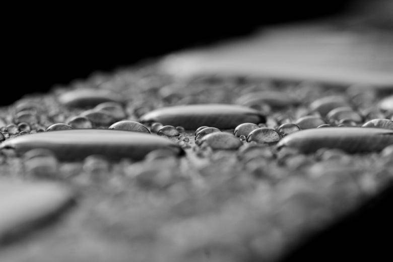 Water Droplets On Wood Background