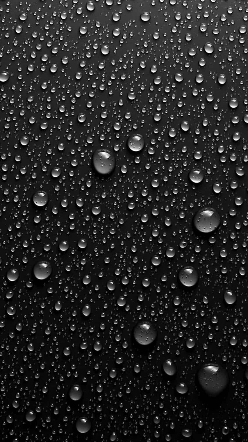 Water Drops On A Black Background