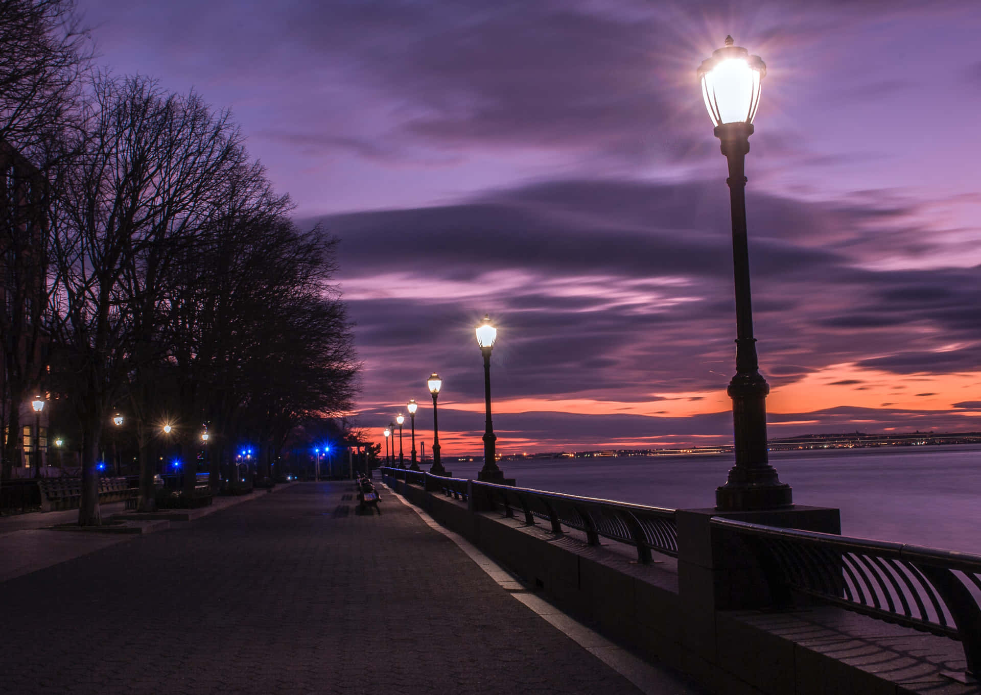 Waterfront Walkway During Evening Background