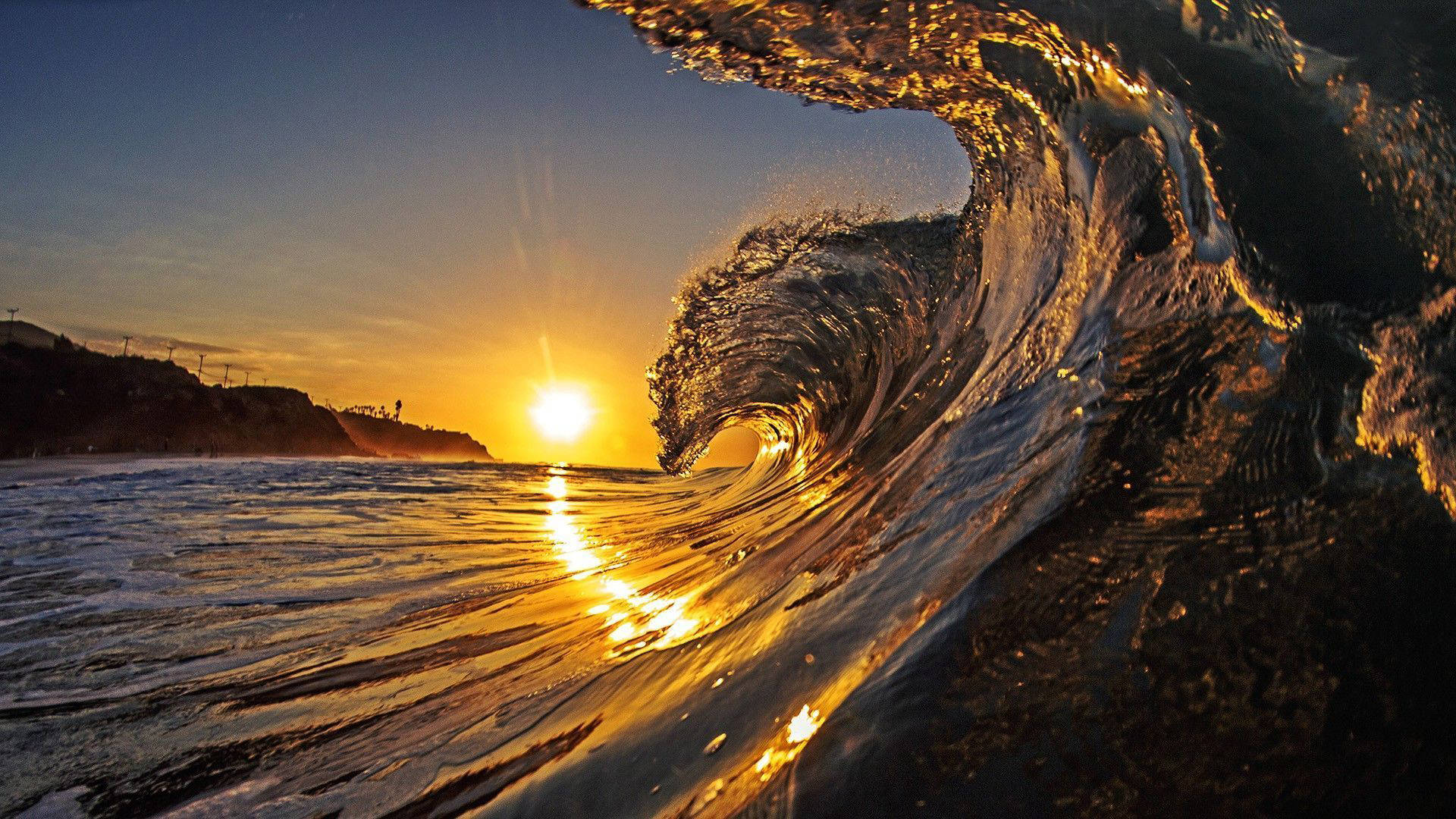 Waves On Beach During Sunset