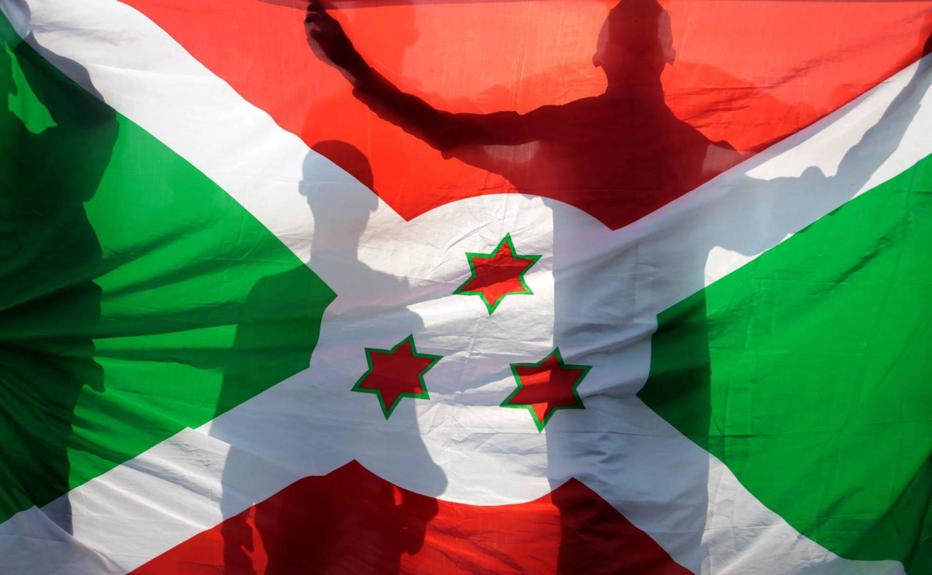 Waving Flag Of Burundi With Shadows Background