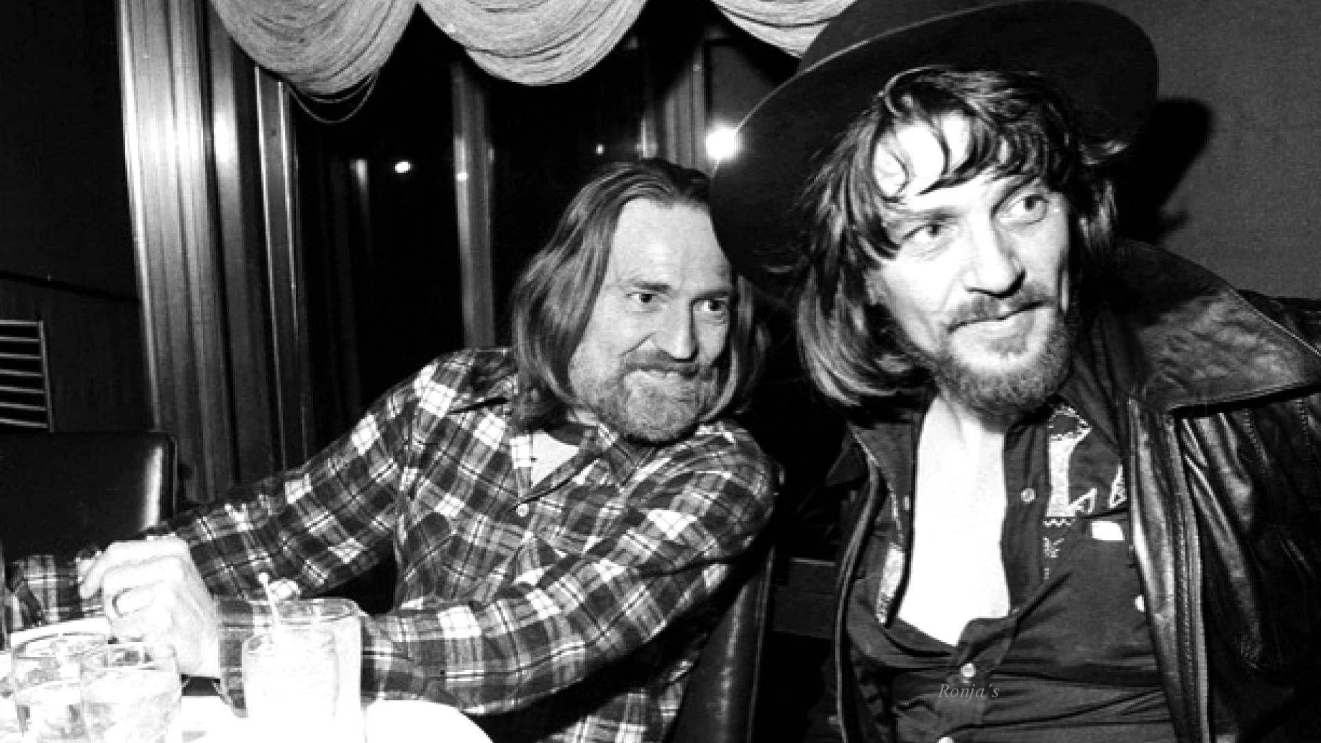 Waylon Jennings In Party Background