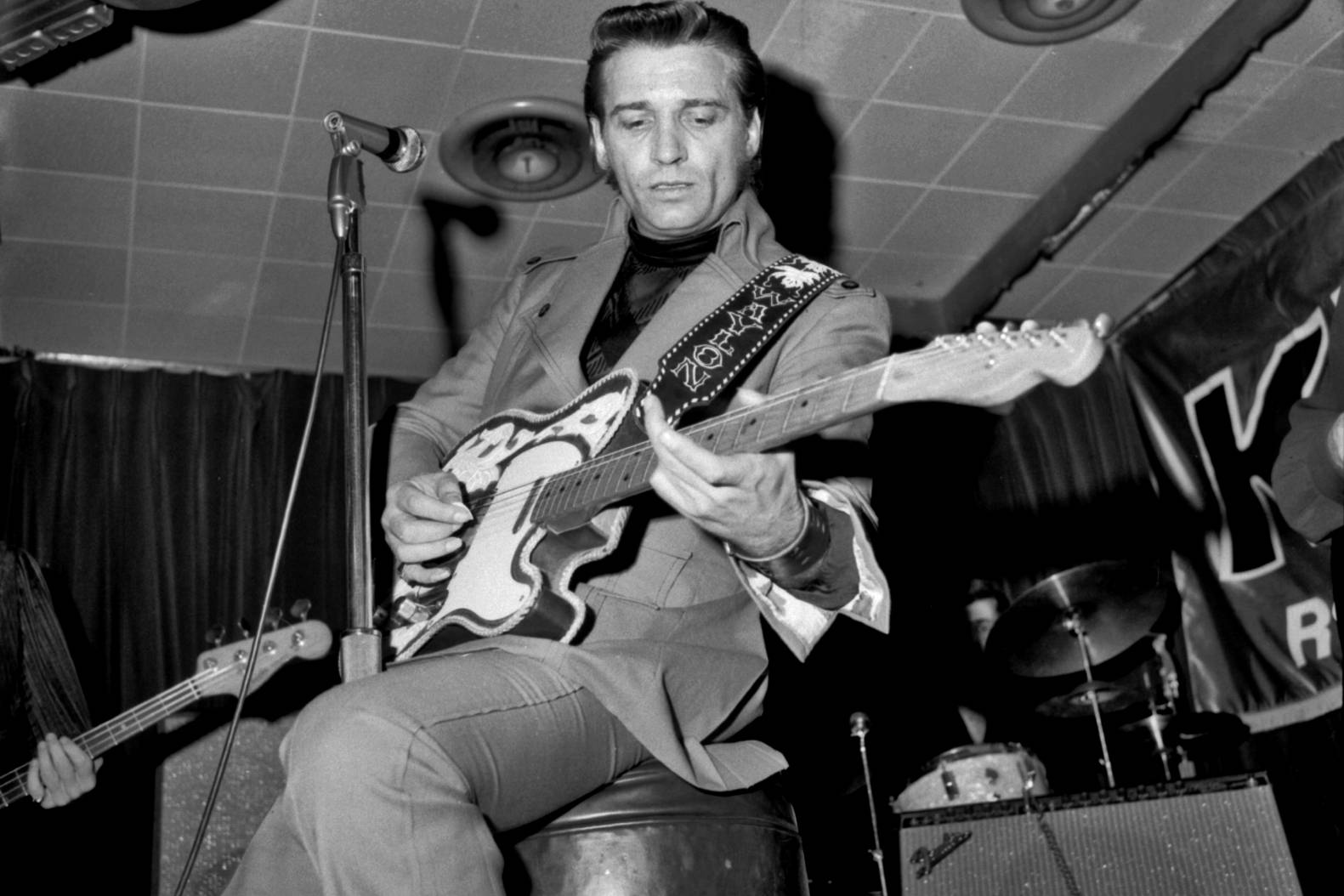 Waylon Jennings Playing Guitar