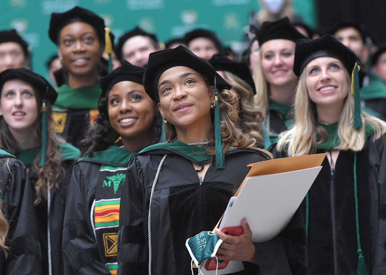 Wayne State University Graduates Looking Up Background