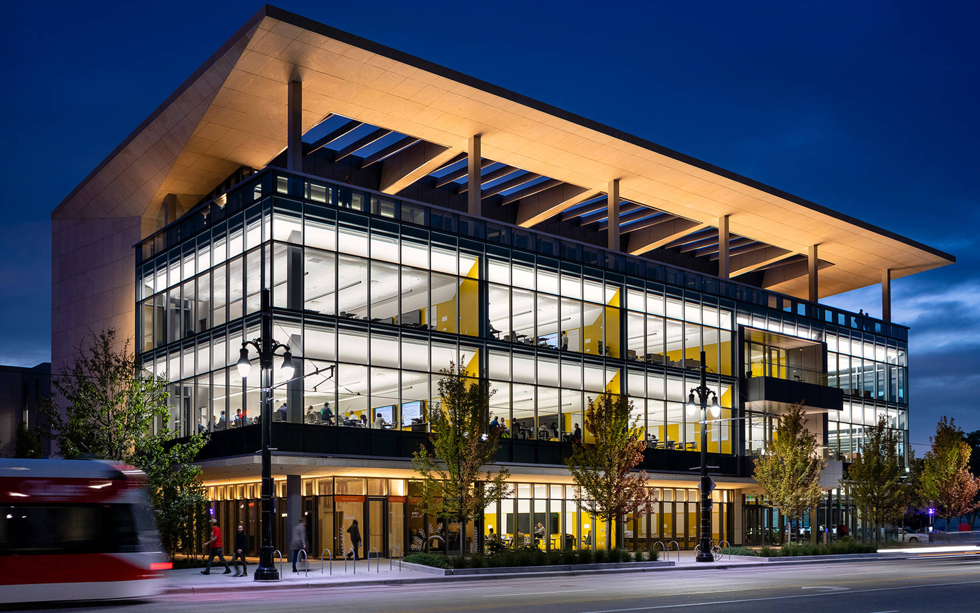 Wayne State University's Mike Ilitch School Of Business At Dusk. Background