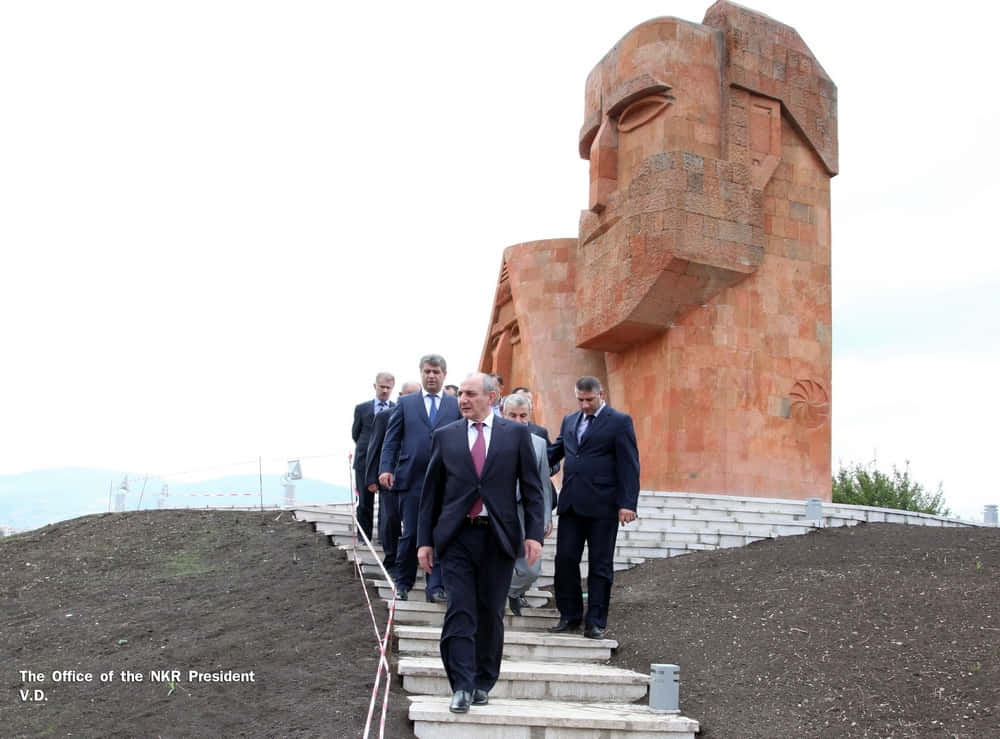 We Are Our Mountains Monument Visit Background