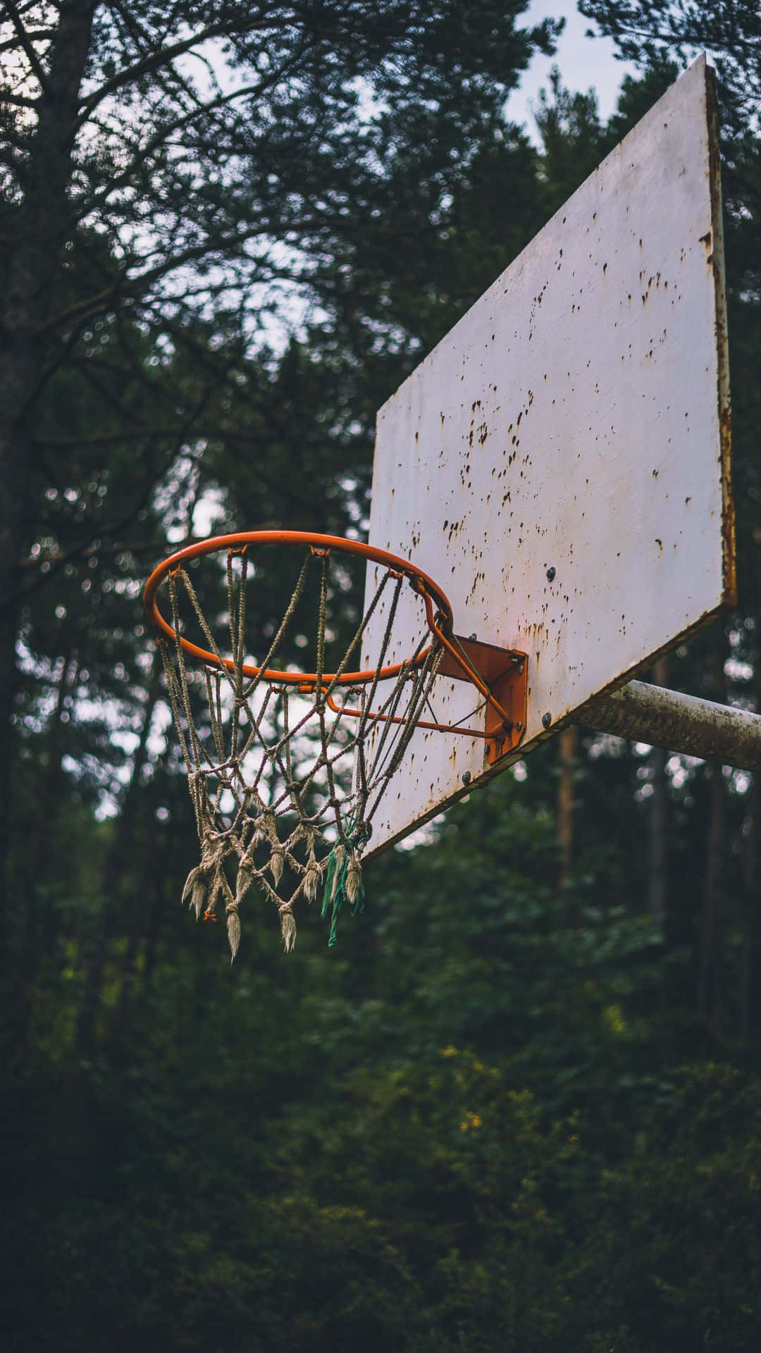 Weathered Outdoor Basketball Hoop Background