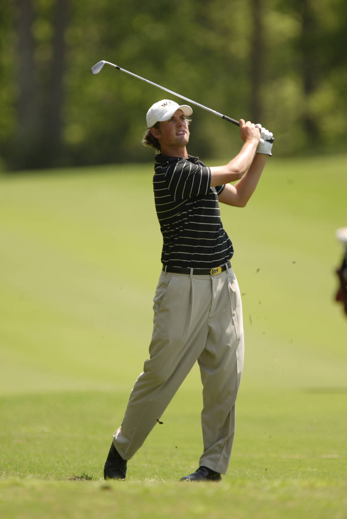 Webb Simpson Hitting A Swing Background