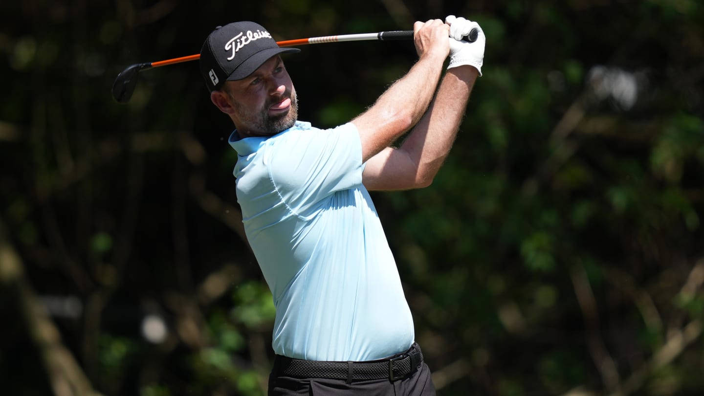 Webb Simpson In A Pale Blue Shirt Background