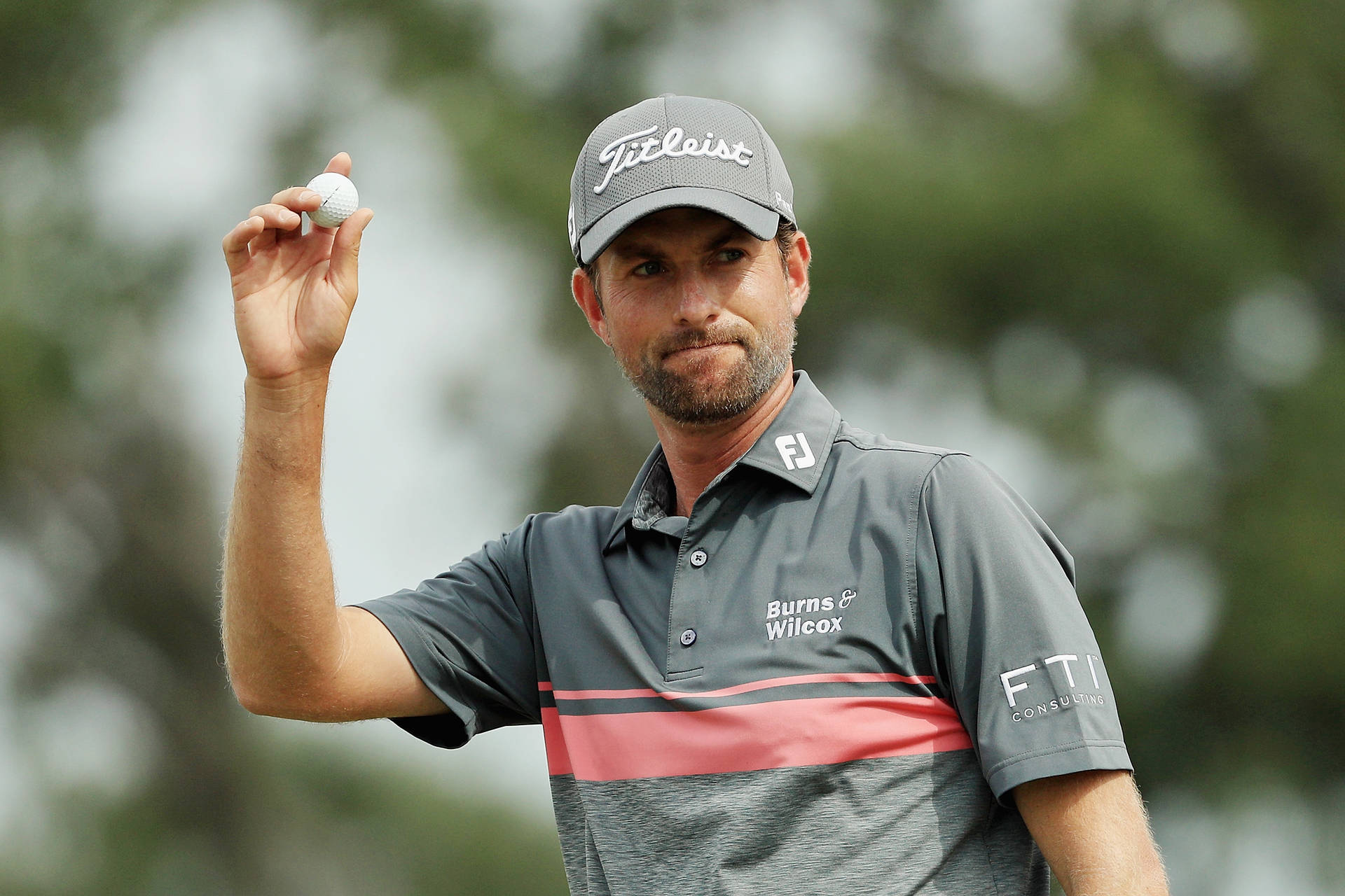 Webb Simpson Showing His Golf Ball Background