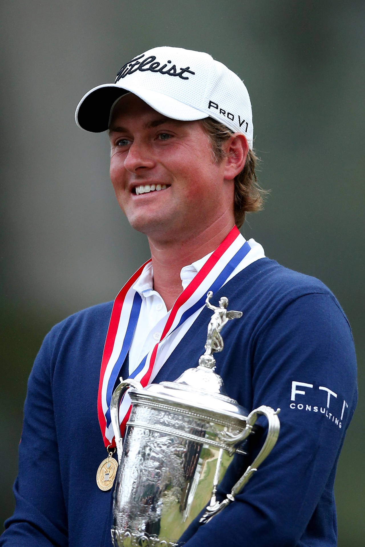 Webb Simpson Smiling With His Awards Background