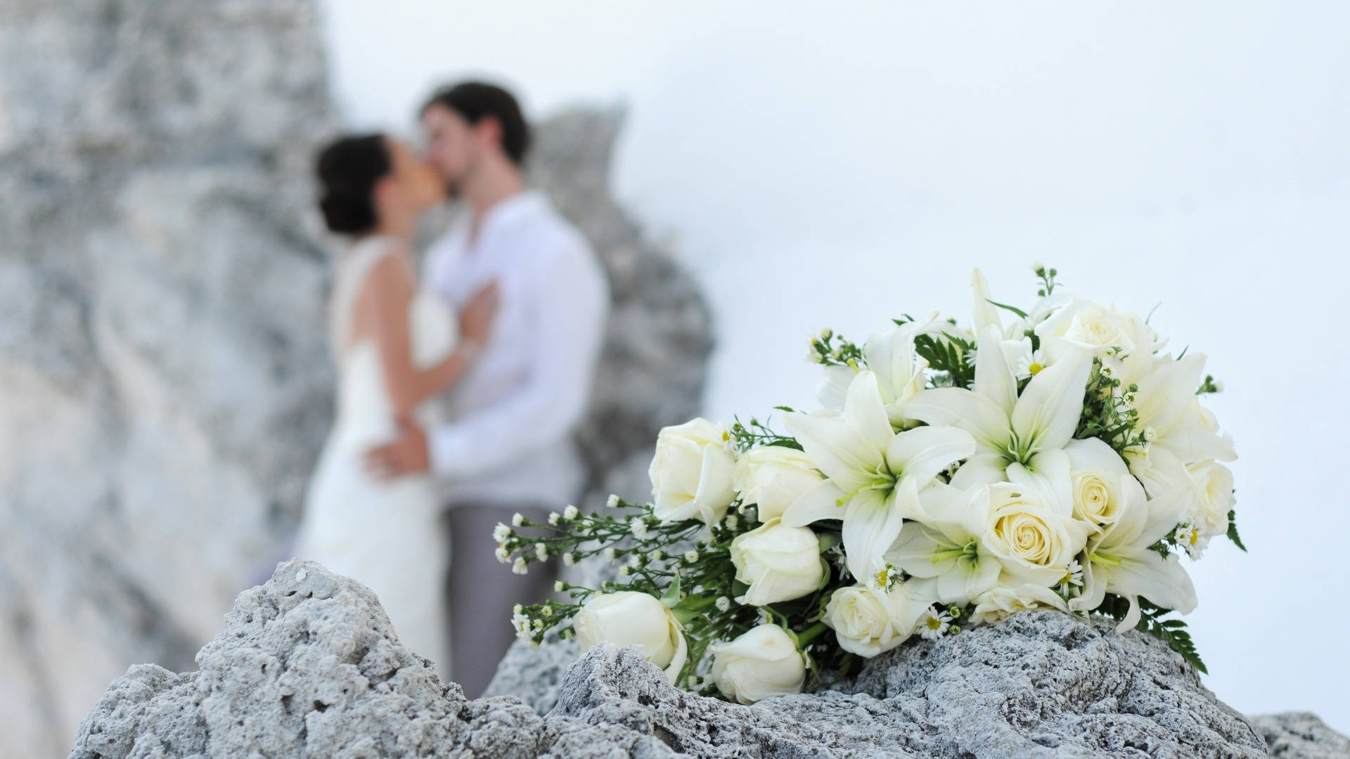 Wedding Bouquet And Kissing Couple Background