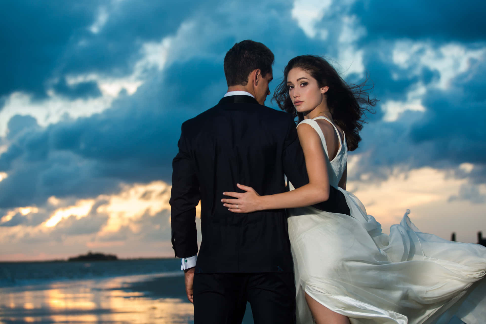 Wedding Couple Beach And Clouds Background