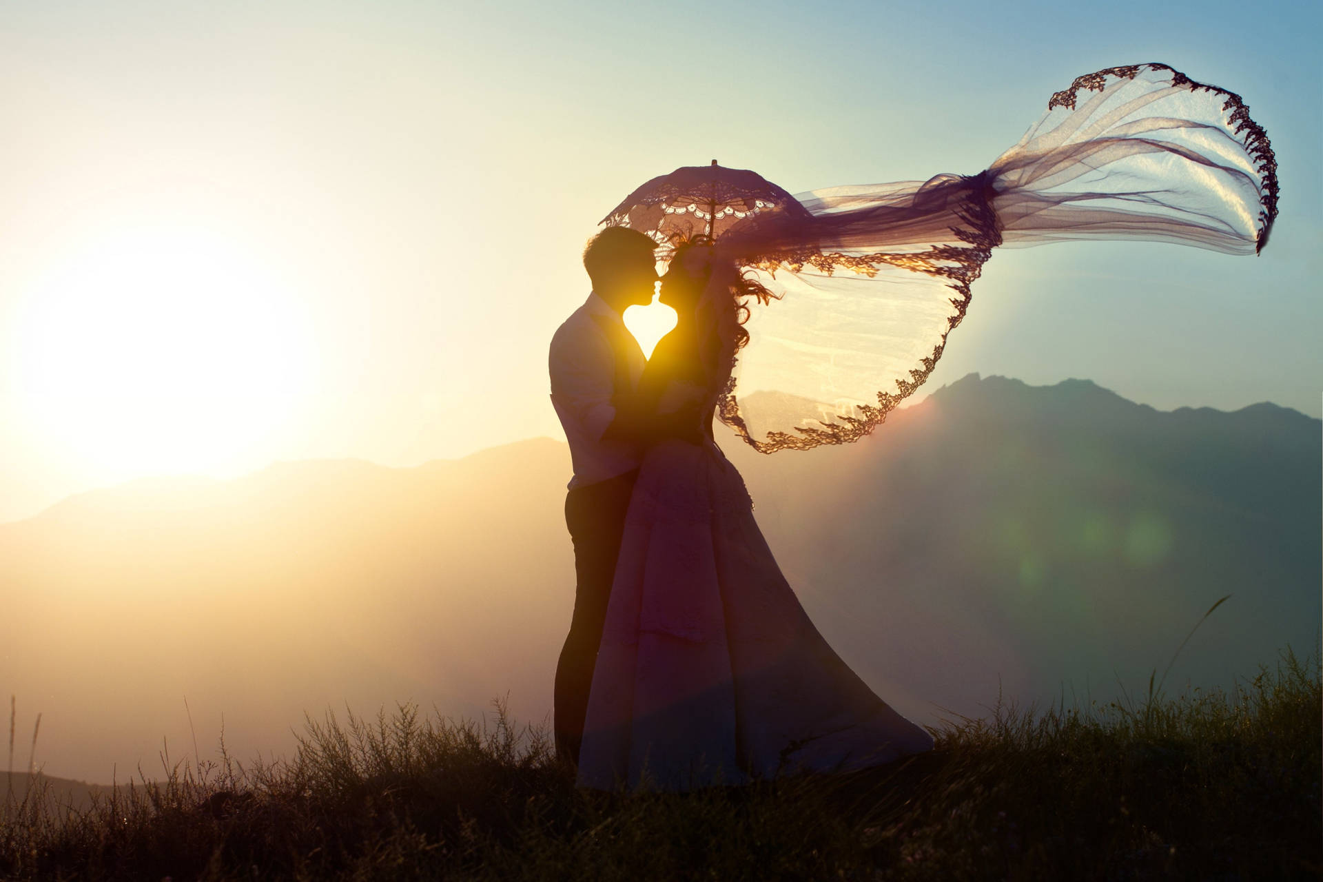 Wedding Couple Silhouette At Sunset Background