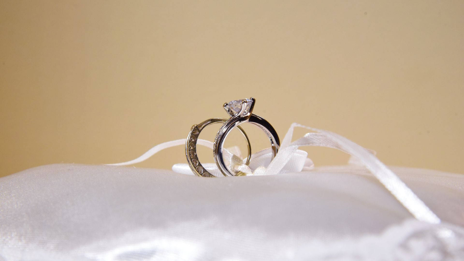 Wedding Ring On A Cushion Background